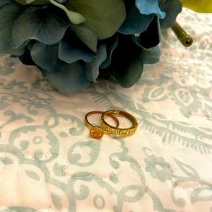 Two Gold Tone Rings